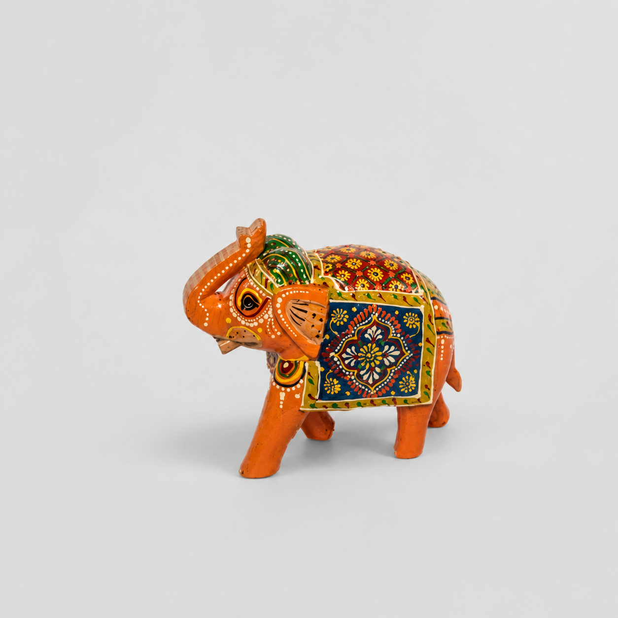 ELEFANTE TROMPA PARADA CHICO NARANJA